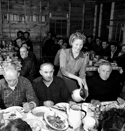 Mrs. Sven Sorenson serving lunch to the men of Camp No. 6 during the construction of the Steep Rock open-face mine